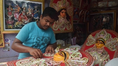 Durga Puja is celebrated for ten days in the Ashwin month. It is not just a festival for the people of Bengal but also an emotion. This year Navratri will commence on October 7, 2021, and will end on October 15, 2021. Due to the current Covid-19 situation, the celebration will be scaled down all over India. Here are a few pictures of how the people of Kolkata are gearing up for the biggest festival in the city. (PTI) Durga Puja is celebrated for ten days in the Ashwin month. It is not just a festival for the people of Bengal but also an emotion. This year Navratri will commence on October 7, 2021, and will end on October 15, 2021. Due to the current Covid-19 situation, the celebration will be scaled down all over India. Here are a few pictures of how the people of Kolkata are gearing up for the biggest festival in the city. (PTI)