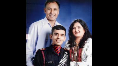 Major Anuj Rajput with his parents KS Arya and Usha in happier times. He was an only child and was set to get married soon. (HT FILE)