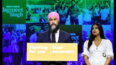Canada’s New Democratic Party leader Jagmeet Singh, accompanied by his wife Gurkiran Kaur Sidhu, delivers remarks on election night in Vancouver, British Columbia. (Reuters) Canada’s New Democratic Party leader Jagmeet Singh, accompanied by his wife Gurkiran Kaur Sidhu, delivers remarks on election night in Vancouver, British Columbia. (Reuters)