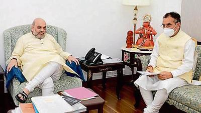 Union home minister Amit Shah with HP urban development minister Suresh Bhardwaj in New Delhi on Tuesday. (HT Photo)