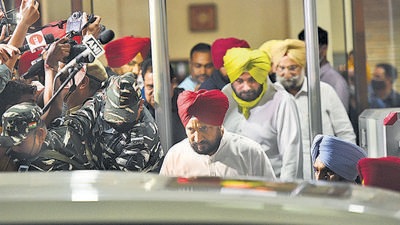 Chief minister Charanjit Singh Channi along with state Congress president Navjot Singh Sidhu at Punjab Bhawan in New Delhi on Tuesday. (Raj K Raj/HT)