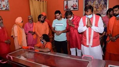 Deputy Chief Minister Keshav Prasad Maurya paying his last respects to Mahant Narendra Giri at Baghambari Math ashram in Prayagraj on Tuesday. (Anil Kumar Maurya/HT photo)
