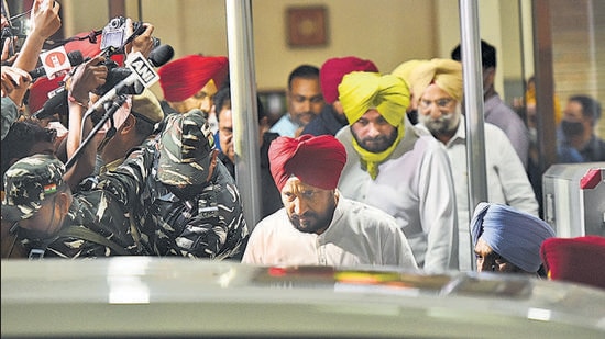 Chief minister Charanjit Singh Channi along with state Congress president Navjot Singh Sidhu at Punjab Bhawan in New Delhi on Tuesday. (Raj K Raj/HT)
