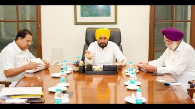 Punjab chief minister Charanjit Singh Channi along with his deputies Sukhjinder Singh Randhawa and OP Soni at the first cabinet meeting after taking charge in Chandigarh. Channi and Randhawa asked for a survey of the prices of sand; and how to provide it at cheaper rates to consumers. (HT Photo) Punjab chief minister Charanjit Singh Channi along with his deputies Sukhjinder Singh Randhawa and OP Soni at the first cabinet meeting after taking charge in Chandigarh. Channi and Randhawa asked for a survey of the prices of sand; and how to provide it at cheaper rates to consumers. (HT Photo)