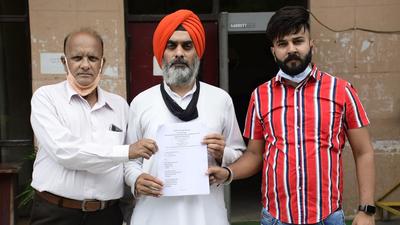BJP leaders submitted a memorandum with deputy commissioner Varinder Sharma’s office, seeking cancellation of the allotment of land to Nehru Sidhant Kender. (Harsimar Pal Singh/HT) BJP leaders submitted a memorandum with deputy commissioner Varinder Sharma’s office, seeking cancellation of the allotment of land to Nehru Sidhant Kender. (Harsimar Pal Singh/HT)