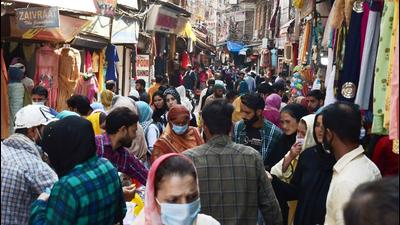 Shops are opened and customers visit without following Covid protocols in Srinagar on Wednesday even as cases are rising. (ANI) Shops are opened and customers visit without following Covid protocols in Srinagar on Wednesday even as cases are rising. (ANI)
