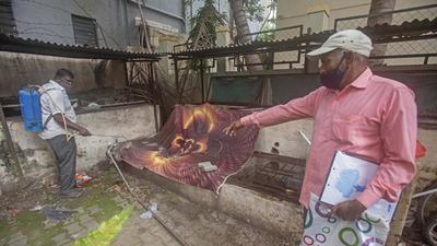 A PMC worker fumigates premises of a housing society, on Tuesday. Since the past three months, city hospitals have witnessed a surge in confirmed dengue positive cases. PMC health department reports only 242 confirmed dengue cases from May to September 18. (PRATHAM GOKHALE/HT) A PMC worker fumigates premises of a housing society, on Tuesday. Since the past three months, city hospitals have witnessed a surge in confirmed dengue positive cases. PMC health department reports only 242 confirmed dengue cases from May to September 18. (PRATHAM GOKHALE/HT)