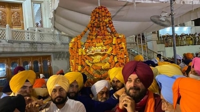 Punjab chief minister Charanjit Singh Channi with state Congress chief Navjot Singh Sidhu at the Golden Temple in Amritsar early on Wednesday. (HT Photo) Punjab chief minister Charanjit Singh Channi with state Congress chief Navjot Singh Sidhu at the Golden Temple in Amritsar early on Wednesday. (HT Photo)