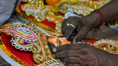 It is on the day of Mahalaya when sculptors make Goddess Durga’s eyes and fill it with colour. (PTI) It is on the day of Mahalaya when sculptors make Goddess Durga’s eyes and fill it with colour. (PTI)