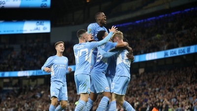 Manchester City's Cole Palmer celebrates scoring their sixth goal with teammates. (Action Images via Reuters)