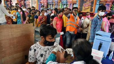 A beneficiary receives a dose of Covid-19 vaccine during a special camp outside a temple in Hyderabad. (File photo) A beneficiary receives a dose of Covid-19 vaccine during a special camp outside a temple in Hyderabad. (File photo)