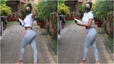 Malaika was clicked by the paparazzi outside her yoga studio on Wednesday in Mumbai. The star looked like she was ready to slay at the gym wearing a chic workout set. If you need the inspiration to ramp up your gym closet, here's your cue. (HT Photo/Varinder Chawla)