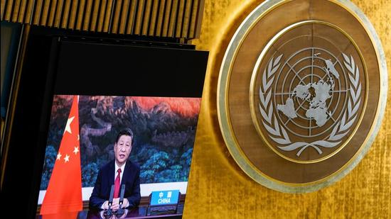 Chinese President Xi Jinping speaks remotely during the 76th UNGA at UN Headquarters in New York on September 21, 2021. He said China will no longer build new coal-fired power projects abroad in view of the need to address climate change. (REUTERS)