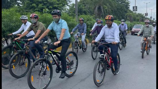Faridabad district officials cycle to their office, instead of using motorised vehicles, on Wednesday. Faridabad district officials cycle to their office, instead of using motorised vehicles, on Wednesday.