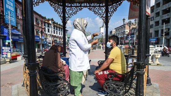 A medic prepares to administer a dose of Covid-19 vaccine to a beneficiary in Srinagar on Wednesday. (PTI) A medic prepares to administer a dose of Covid-19 vaccine to a beneficiary in Srinagar on Wednesday. (PTI)