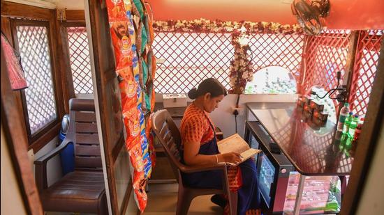 An attendant takes stock of supplies inside a mobile toilet on a bus at a public park in Pune. The project, launched in 2016 by entrepreneurs, has 11 mobile washrooms, which are on average used by more 200 women daily. (File photo)