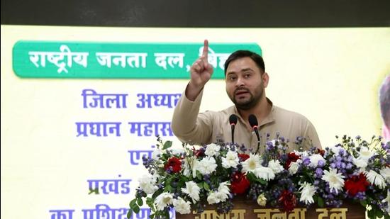 RJD MLA Tejashwi Yadav addresses the gathering during a party training camp at his residence in Patna on Wednesday. (Santosh Kumar/HT Photo)