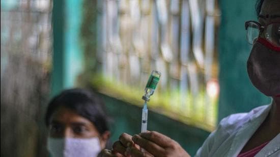 A health worker prepares a dose of vaccine against Covid-19 at a camp in Siliguri, West Bengal, earlier this month. (File photo)