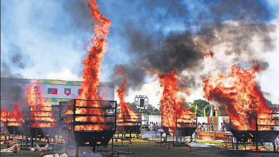 Assam forest officials burn rhino horns at Bokakhat stadium in Golaghat on Wednesday. (ANI)