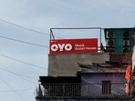The logo of Oyo is seen installed on a hotel building in New Delhi.