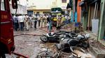 Charred remains of a vehicles after a blast at New Tharagupet area in Benagaluru on Thursday. At least 2 people died in suspected cracker blast. (PTI) Charred remains of a vehicles after a blast at New Tharagupet area in Benagaluru on Thursday. At least 2 people died in suspected cracker blast. (PTI)