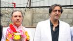 People's Conference president Sajjad Gani Lone (right) welcomes former Jammu and Kashmir Bank chairperson Parvez Ahmad Nengroo into the party fold in Srinagar on Thursday. (ANI) People's Conference president Sajjad Gani Lone (right) welcomes former Jammu and Kashmir Bank chairperson Parvez Ahmad Nengroo into the party fold in Srinagar on Thursday. (ANI)