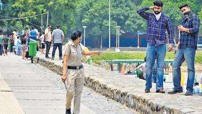 Most Indians keep the mask a little lower, like some trendy chin-wear. The few who wear it correctly lower it to talk. In rural India, mask sharing is rampant. (Ravi Kumar/HT file photo)