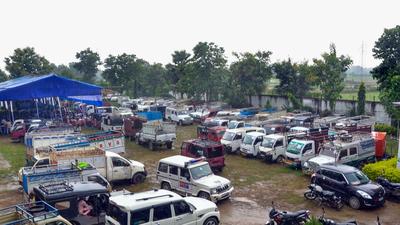 Vehicles parked at Jagdev Memorial College (converted into election cluster) on the eve of the first phase of Bihar Panchayat Elections, 2021, at Kudra block of Kaimur district on Thursday. (PTI) Vehicles parked at Jagdev Memorial College (converted into election cluster) on the eve of the first phase of Bihar Panchayat Elections, 2021, at Kudra block of Kaimur district on Thursday. (PTI)