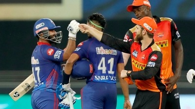 Delhi Capitals and Sunrisers Hyderabad players doing handshakes with each others. (ANI)