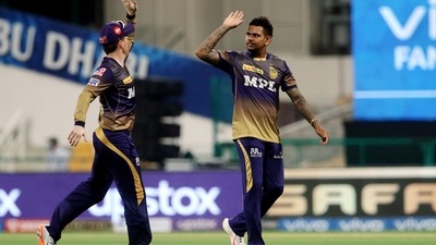 UAE, Sept 23: Sunil Narine and Eoin Morgan of Kolkata Knight Riders celebrate the wicket of Rohit Sharma skipper of Mumbai Indians during the IPL match between the Kolkata Knight Riders and the Mumbai Indians, at the Sheikh Zayed Stadium in Abu Dhabi on Thursday. (ANI) UAE, Sept 23: Sunil Narine and Eoin Morgan of Kolkata Knight Riders celebrate the wicket of Rohit Sharma skipper of Mumbai Indians during the IPL match between the Kolkata Knight Riders and the Mumbai Indians, at the Sheikh Zayed Stadium in Abu Dhabi on Thursday. (ANI)