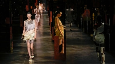 Models wear creations for the Fendi Spring Summer 2022 collection during Milan Fashion Week, in Milan, Italy (AP Photo/Antonio Calanni) Models wear creations for the Fendi Spring Summer 2022 collection during Milan Fashion Week, in Milan, Italy (AP Photo/Antonio Calanni)