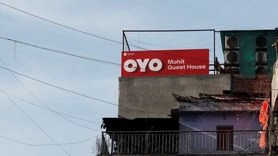 The logo of Oyo is seen installed on a hotel building in New Delhi. (Reuters File Photo)
