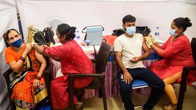 A vaccination camp at Valia College in Mumbai on Tuesday, September 21. (PTI) A vaccination camp at Valia College in Mumbai on Tuesday, September 21. (PTI)