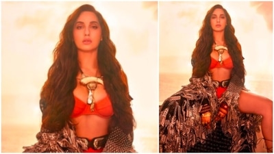 Nora Fatehi opted for an orange bikini which she paired with a printed cape for her latest magazine photoshoot. (Instagram/@norafatehi)