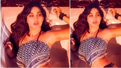 In another set of pictures shared by Nora Fatehi on her Instagram handle, the actor and dancer can be seen in a scarf top. (Instagram/@norafatehi)
