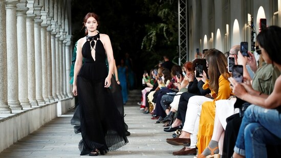 Model Gigi Hadid presents creation from the Alberta Ferretti Spring/Summer 2022 collection during Milan Fashion Week in Milan, Italy(REUTERS/Alessandro Garofalo)