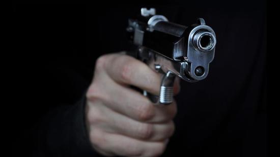 The wanted man, Rajan Kumar, allegedly fired at least three shots at the police and in the melee, ran to the rooftop of the house. He threatened to shoot himself if the police tried to follow him. (Representative image/Getty Images & iStockphoto)