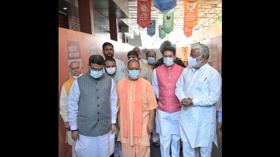 An exhibition on Prime Minister Narendra Modi’s life and times was attended by UP chief minister Yogi Adityanath, Union education minister Dharmendra Pradhan, information and broadcasting minister Anurag Thakur, UP BJP chief Swatantra Dev among others at the UP BJP headquarters, in Lucknow, on Thursday. (HT Photo)