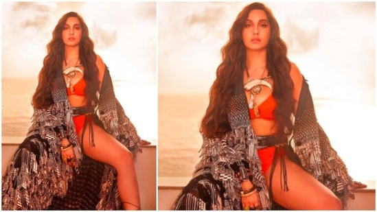 Nora Fatehi accessorised her sultry look with a huge, shiny black belt.(Instagram/@norafatehi)