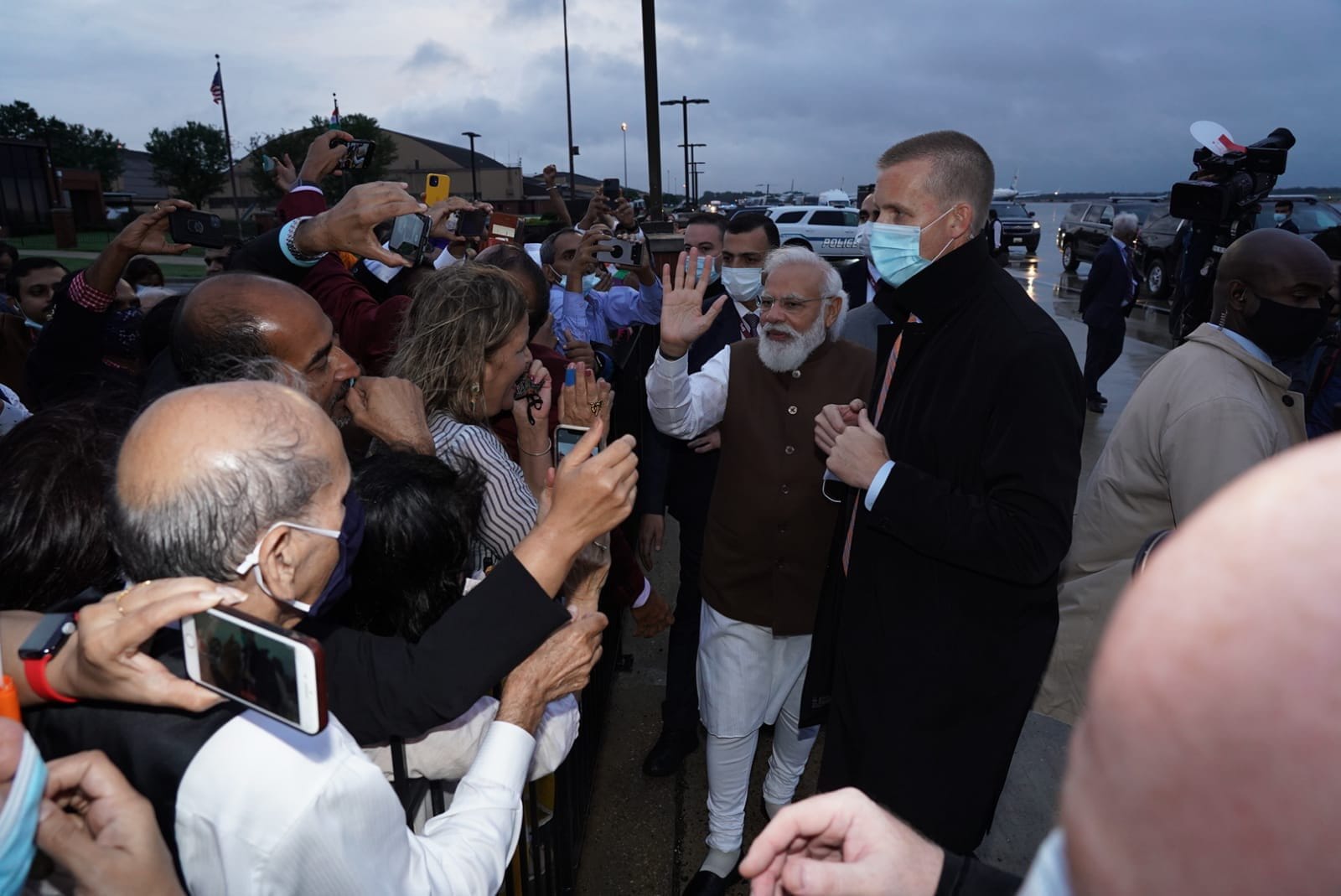 PM Modi with the Indian-American community after landing at Washington airport.(Twitter/@narendramodi)