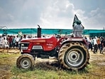 A farmer sits on a tractor as he attends a mahapanchayat in Uttar Pradesh’s Muzaffarnagar earlier this month. REUTERS A farmer sits on a tractor as he attends a mahapanchayat in Uttar Pradesh’s Muzaffarnagar earlier this month. REUTERS