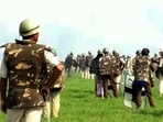 File photo of police trying to disperse protestors during an agitation against an eviction drive, in Darrang district. File photo of police trying to disperse protestors during an agitation against an eviction drive, in Darrang district.