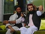 Taliban fighters take their selfie with a mobile phone inside the home of the Afghan warlord Abdul Rashid Dostum in the Sherpur neighborhood of Kabul. Taliban fighters take their selfie with a mobile phone inside the home of the Afghan warlord Abdul Rashid Dostum in the Sherpur neighborhood of Kabul.