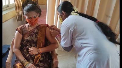 A woman in Thane rural area gets vaccinated against Covid. Social workers had to lure them with Bollywood movies and photos of actors getting jabbed to get their vaccination. (HT PHOTO) A woman in Thane rural area gets vaccinated against Covid. Social workers had to lure them with Bollywood movies and photos of actors getting jabbed to get their vaccination. (HT PHOTO)