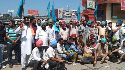 Roadways employees stage a protest in Punjab’s Patiala in support of their demands. (HT photo)