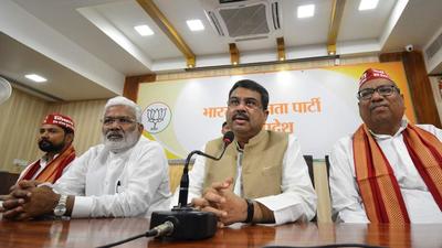 BJP leader and Union education minister Dharmendra Pradhan (centre) at a press conference in Lucknow. (Deepak Gupta/HT Photo) BJP leader and Union education minister Dharmendra Pradhan (centre) at a press conference in Lucknow. (Deepak Gupta/HT Photo)