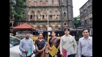 Kharghar Forum members outside the High Court. They have filed write petition against Panvel City Municipal Corporation for double taxation (HT PHOTO)