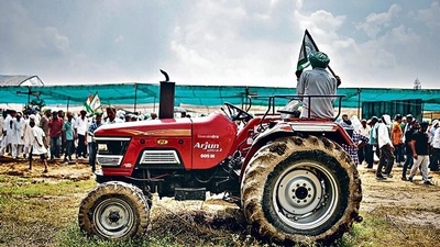 A farmer sits on a tractor as he attends a mahapanchayat in Uttar Pradesh’s Muzaffarnagar earlier this month. REUTERS A farmer sits on a tractor as he attends a mahapanchayat in Uttar Pradesh’s Muzaffarnagar earlier this month. REUTERS