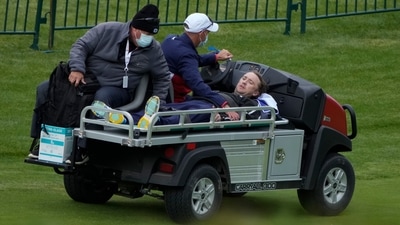 Actor Tom Felton is helped after collapsing on the 18th hole during a practice day at the Ryder Cup at the Whistling Straits Golf Course Thursday. (AP) Actor Tom Felton is helped after collapsing on the 18th hole during a practice day at the Ryder Cup at the Whistling Straits Golf Course Thursday. (AP)