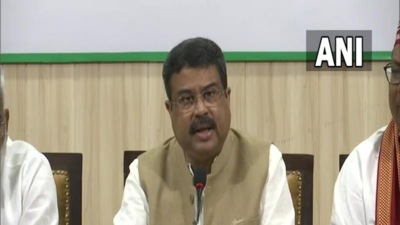 Union minister Dharmendra Pradhan was also present at the conference along with Nishad. (ANI)